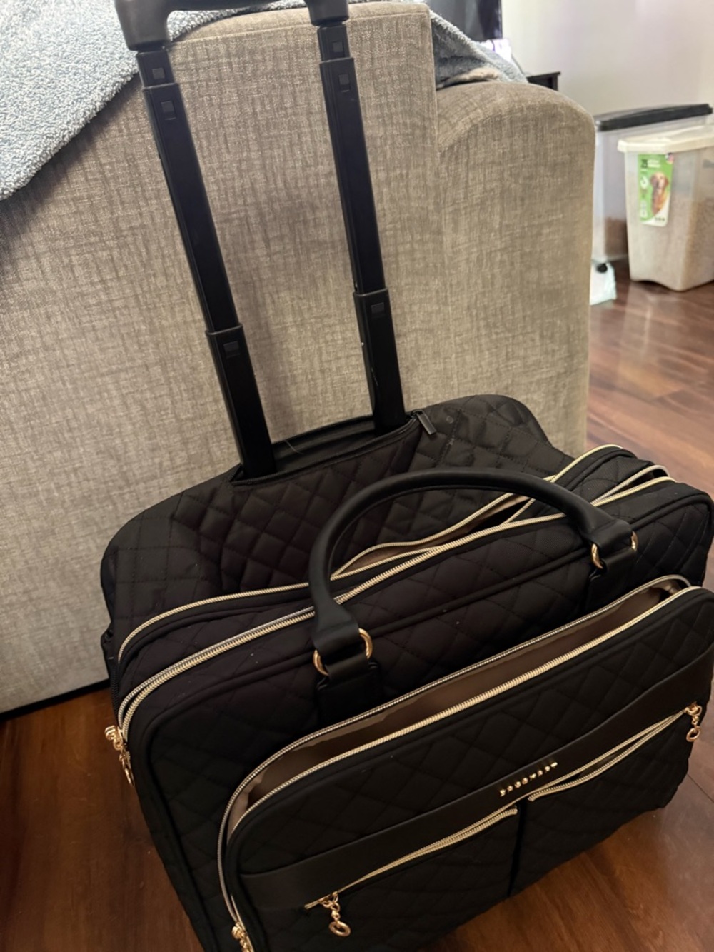 Quilted Black Rolling Laptop Tote with Gold Accents